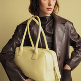 VOYAGE BAG BUTTER YELLOW