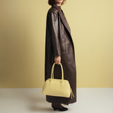 VOYAGE BAG BUTTER YELLOW